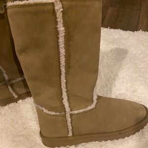 Brand new without tags. Size 9. American Eagle boots.